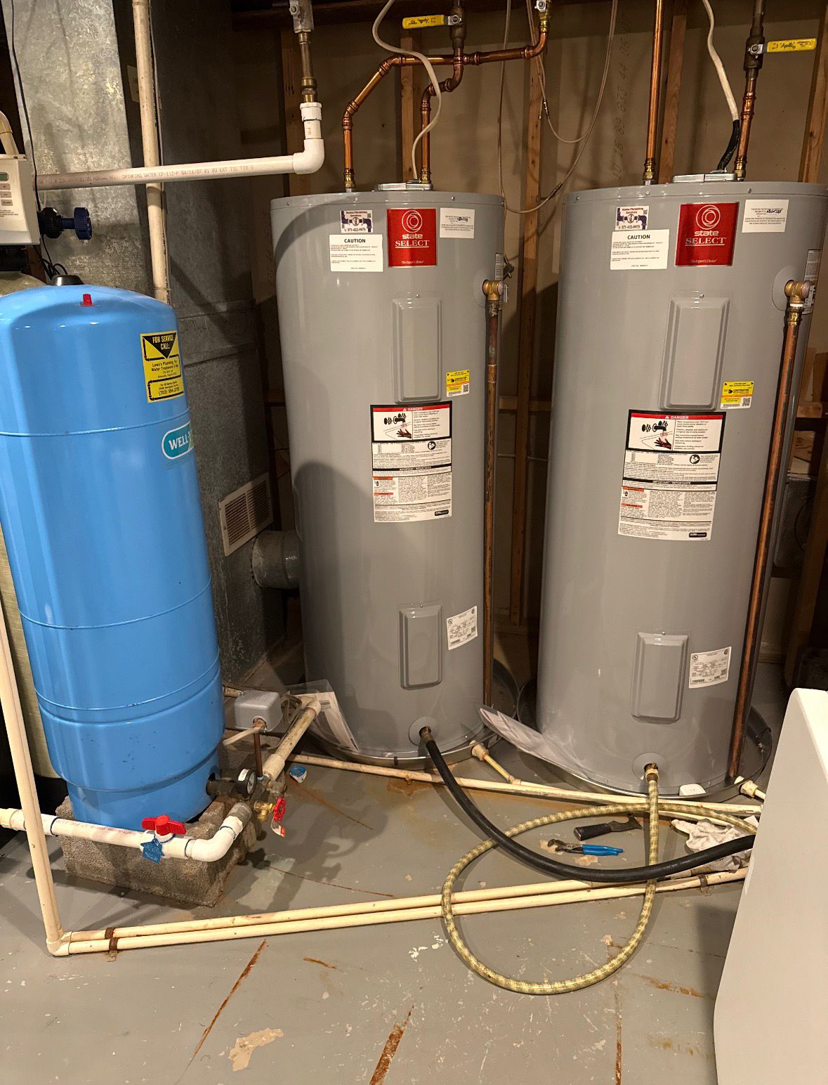 Well tank & dual water heater installation